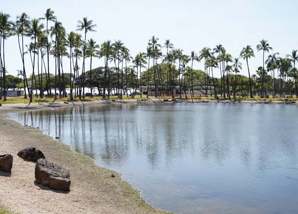 The eroded banks of the Hawaiian Pond were regraded and stabilized with coral aggregate underlain by a tied concrete block mat.