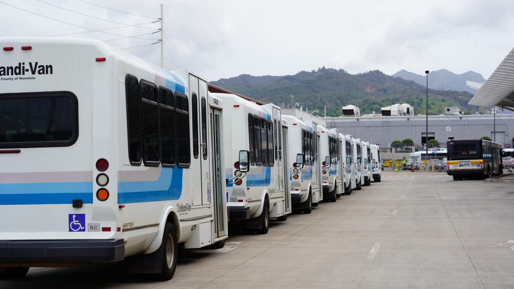 Picture of TheHandi-Van fleet parked at the Kalihi Transit Center