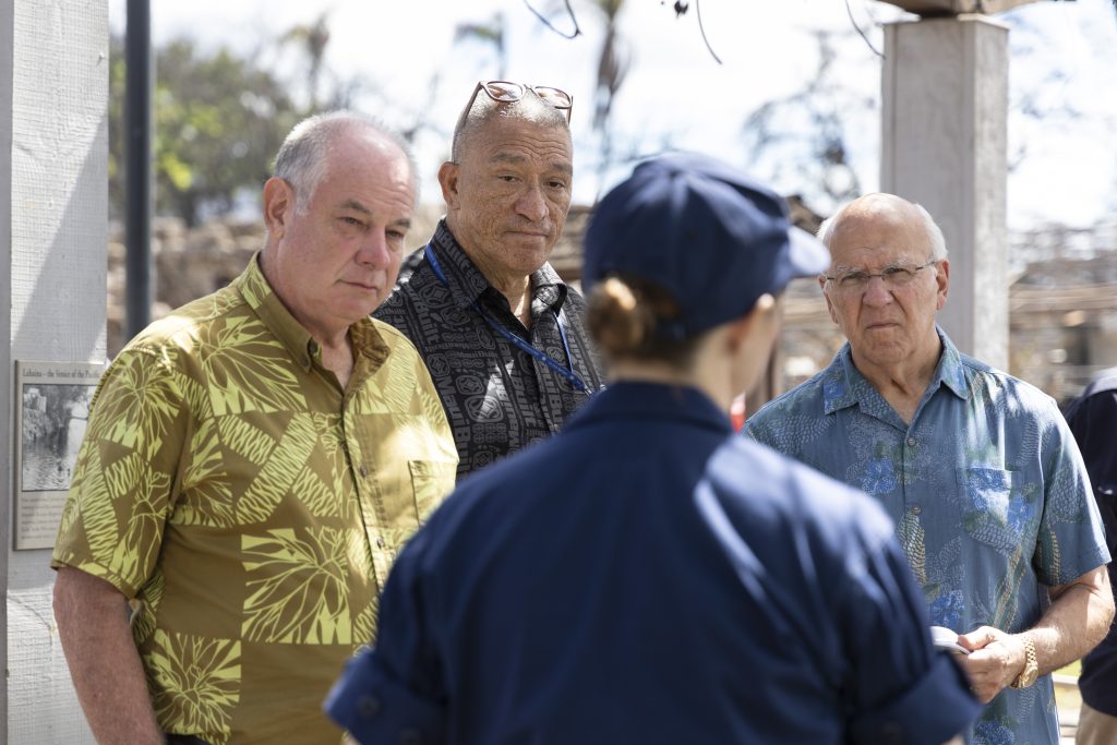 Mayors Blangiardi, Bissen and Roth receive a briefing during a tour of Lahaina 