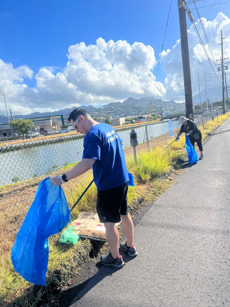 volunteers bagging trash